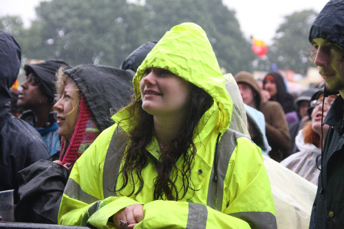 festival goers in rain